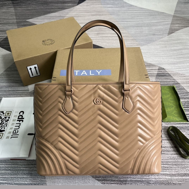 G*u*i shopping bags